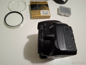 D3100 + AF-S DX Nikkor 18-105 mm f3.5.-5.6G ED VR - 5