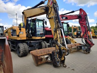 Kolový otočný bagr CAT 318 F - 5