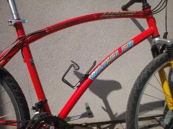 Staré horské kolo Wheeler - shimano Deore LX - 5