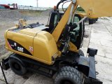 CATERPILLAR M313D - kolové rýpadlo, - 5