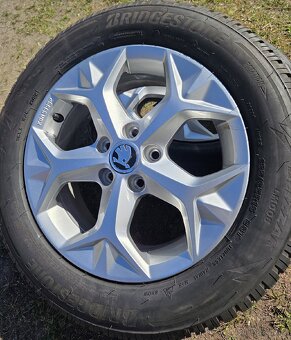 Zánovní zimní sada Seat Ibiza V 15" 5x100 pneu 185/65/15 - 5