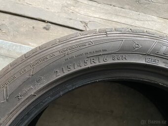 prodám letní pneumatiky 215/45/16 Dunlop celá sada - 5