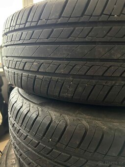 Sada alu kola značky Dezent + letní pneu 195/65R15 - 5