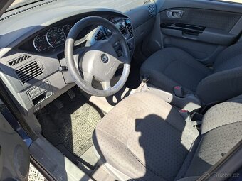 Kia Carens-2.0i - 5