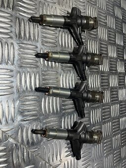 // Vstřikovače Subaru Legacy 2.0D 110kw // - 5