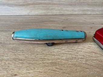 staré hračky plechové hračky retro beruška raketa setrvačník - 5