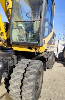 Predám kolesový Bager CATERPILLAR M 312 - 5