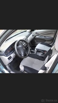 Nissan Almera 1.5 i - 5