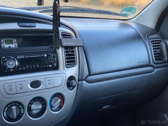 Mazda Tribute 2,3 - 5