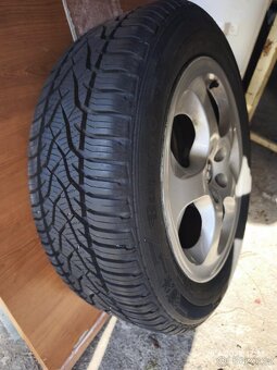 Alu + pneu celoroční 205/55 R16 V XL 5x98 - 5