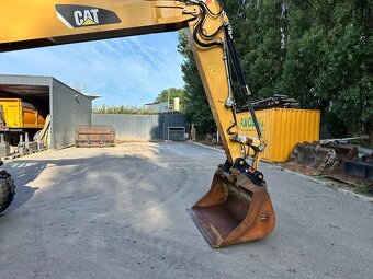 kolové rýpadlo CAT M318F - 5