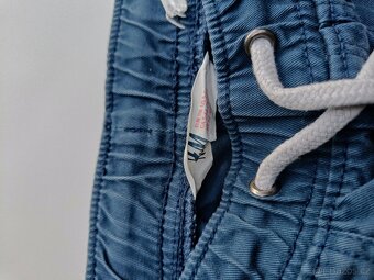 Nepromokavé kalhoty+ balíček oblečení vel 110/116 - 5