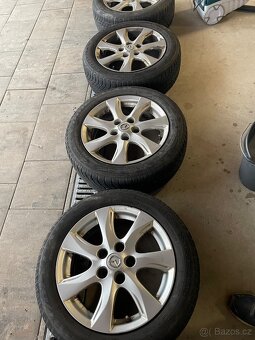 Prodám alu kola Mazda r16 - 5