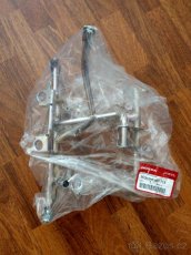 Honda PCX 125 leseni - drzak svetla original nove - 5