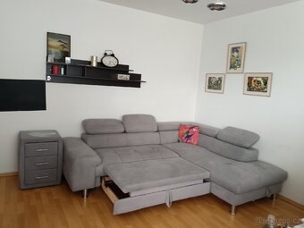 Prodám rohovou rozkládací pohovku s úložným prostorem - 5