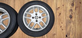 ALU 14" 4x100 ET38 s celoročními pneu 185/60/14 - 5