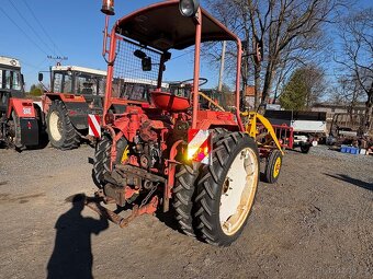 Traktor RS 09 GT 124 s čelním nakladačem atd. - 5