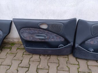 Tapecy Ford Escort 96- - 5