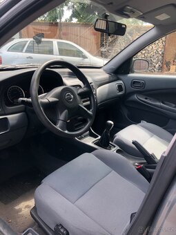 Nissan Almera 1.5i - 5
