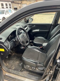Kia Sportage II - 5