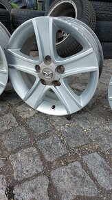 16" SADA ALU DISKŮ MAZDA 7JX16 ET55 - 5