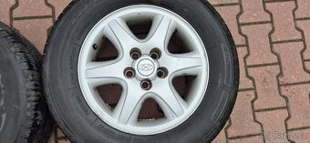 Alu kola Hyundai Tucson 5x114,3 6,5x16 ET41 235/60r16 letní - 5