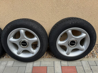Alu kola Zender 15" 4x100, 7Jx15 ET35, zimní pneu 185/65/15 - 5