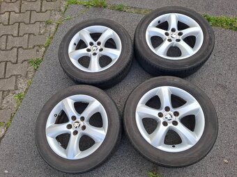 Alu kola 15" Skoda Antares 5x100 letni pneu 195/55R15 - 5