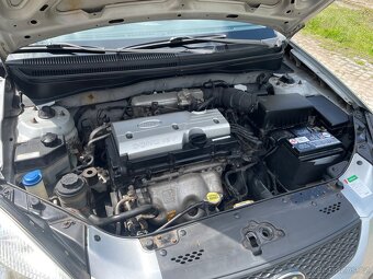 Kia Rio II sedan - 5