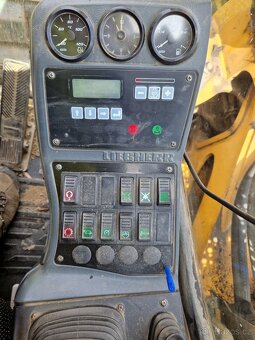 Kolové rypadlo LIEBHERR 311 kolový bagr LIEBHERR A311 - 5