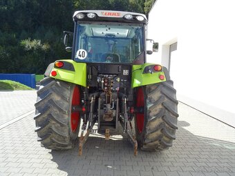 Traktor CLAAS AXOS 310. - 5