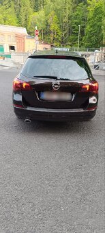 Opel Astra sports touter 2.0 cdti - 5