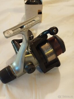RYBÁŘSKÝ NAVIJÁK SHIMANO ALIVIO 1000R + NC - 5
