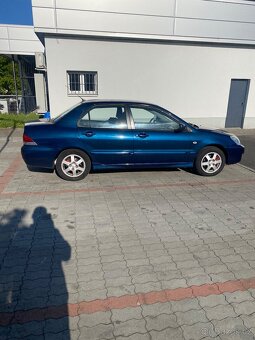 Mitsubishi lancer 1.6 2006r - 5