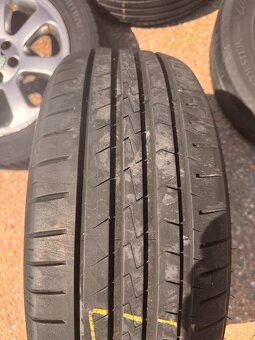 DISKY 16" OCTAVIA 1 LAURIN KLEMENT + PNEU VREDESTEIN 205/55 - 5
