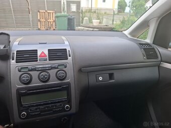 Touran 2.0 125kw - 5