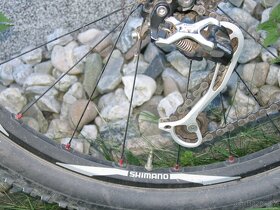 Carbonové horské kolo Shimano XT - 5