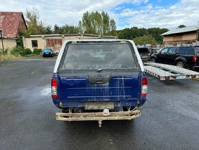 Prodám na Nissan Navara D22 4x4 2,5 nafta 98 KW rv 2003 - 5