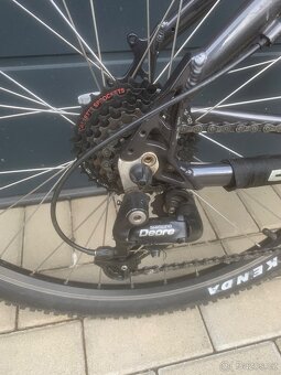 Amulet Enter - Deore, SR Suntour, 26" - 5