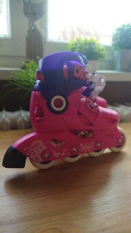 Prodám krásné kolečkové rostoucí brusle značky Oxelo. Velik - 5