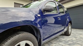 DACIA DUSTER 4x4 1.6i 77KW.6 RYCHLOSTÍ.KLIMA.BLUETOOTH.ALU. - 5