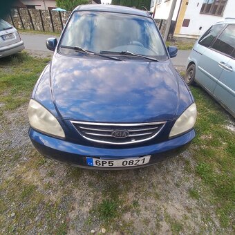 Kia carens - 5