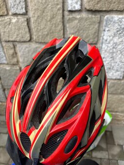 Cyklistické helmy - různé velikosti a motivy - 5