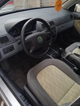 Škoda fabia 1.4 16 v - 5