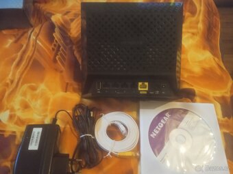 Router Netgear R6100 a Router TP Link Archera MR200 - 5