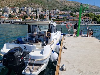 Lodní motor. Suzuki 150. - 5