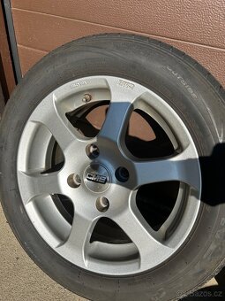 Alu kola+nexen Daewo Nubira 2004 -4x114,3 mm. 56,6 mm. - 5