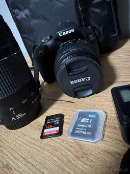 Canon EOS 2000D + EF-S 18-55 mm f/3.5-5.6 IS II + EF 75-300 - 5