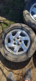 Alu disky mazda tribute - 5