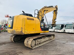 Pásové rypadlo Caterpillar 320W - 5